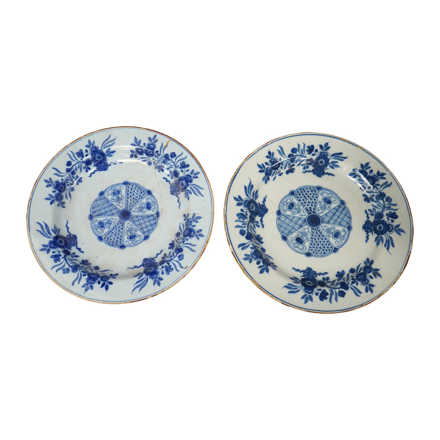 A pair of 18th century Delft plates, 30.5cm. Condition - poor